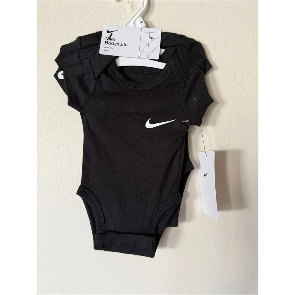 Nike Black newborn Bodysuit with White Swoosh - 3 Pack